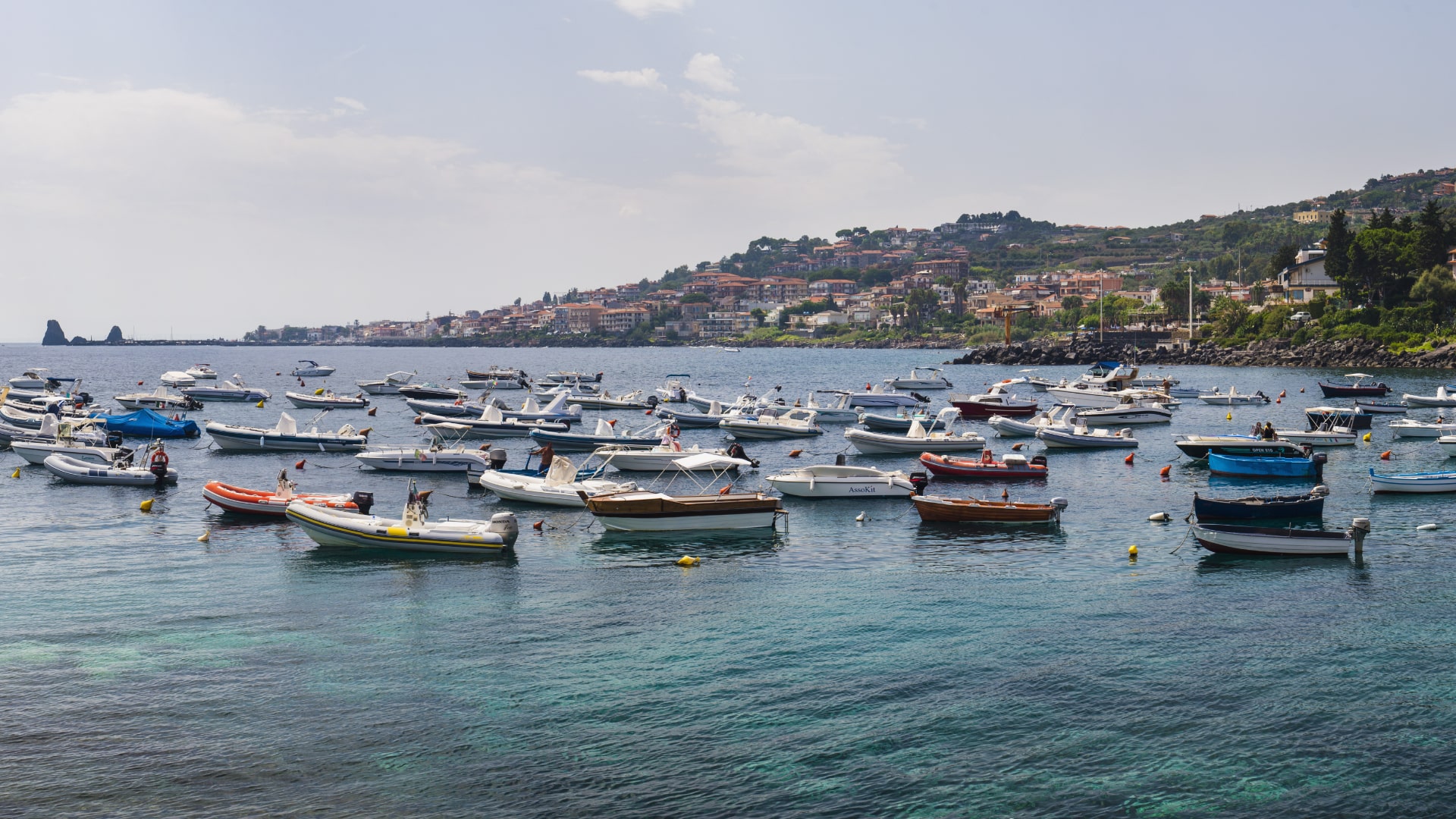 panoramic-photo-of-boats-in-the-harbour-at-aci-tre-2022-03-09-16-33-21-utc-min